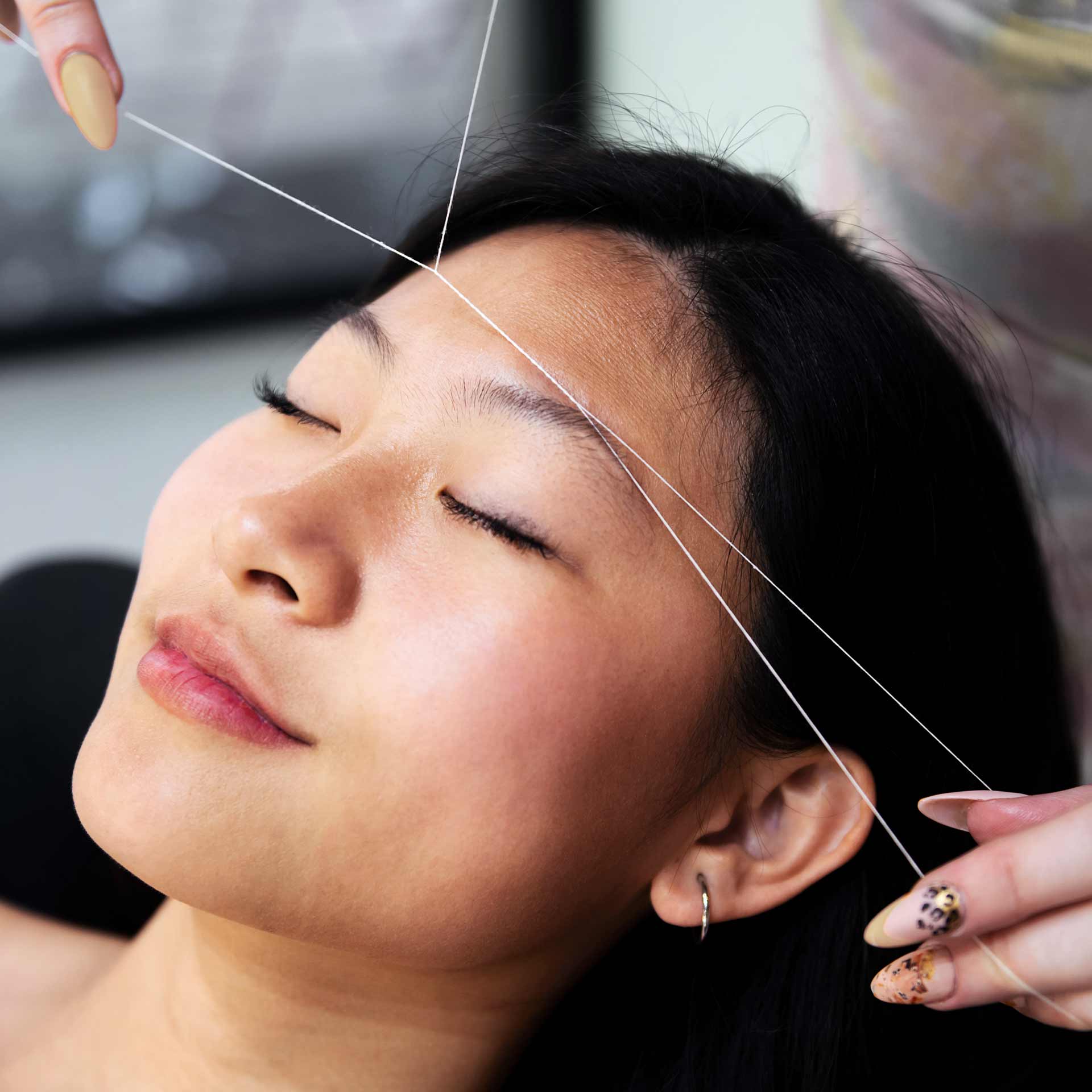 Eyebrow threading treatment at Aesthete Beauty salon in Dundee