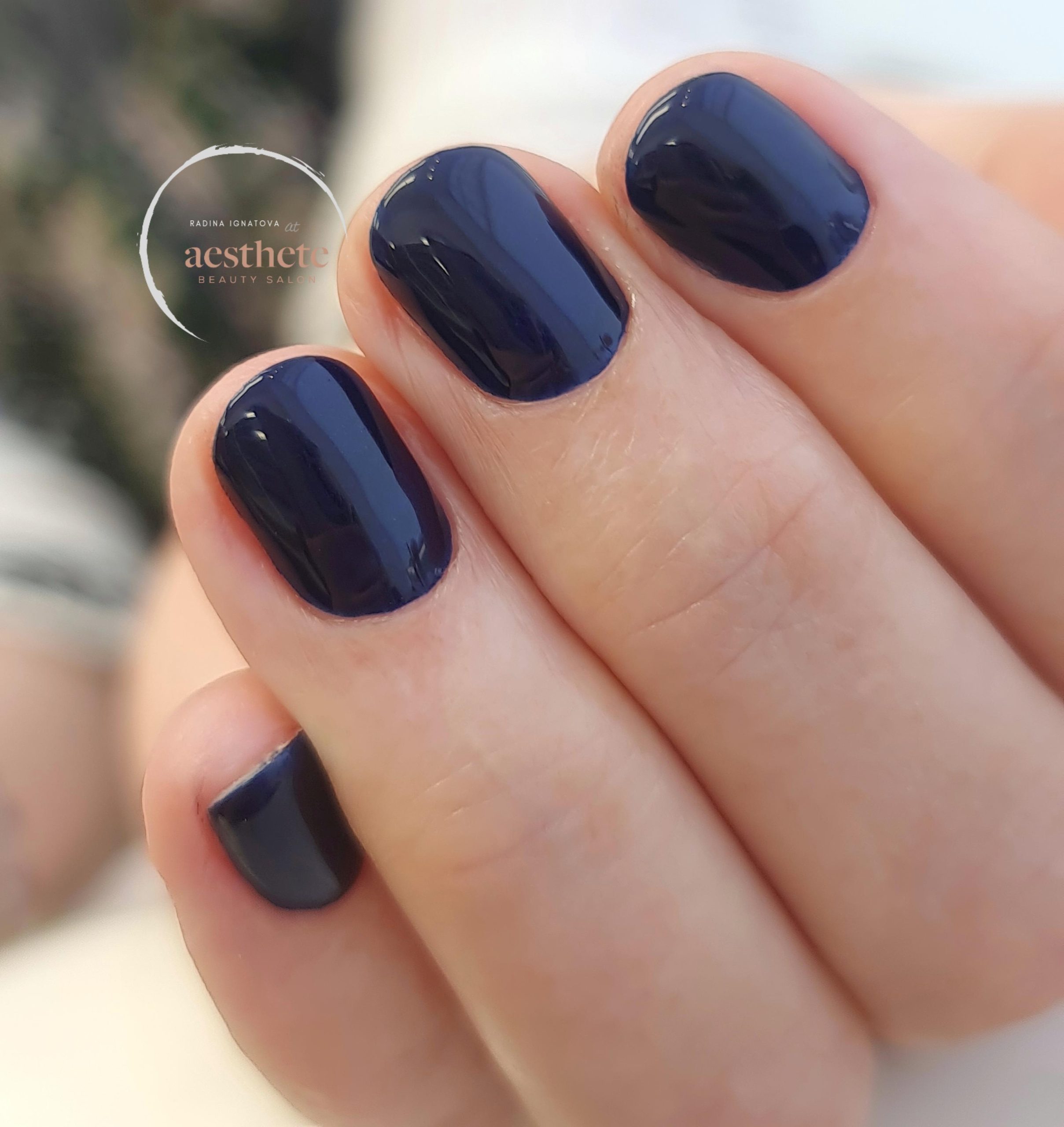 Russian manicure result showing flawless cuticle line with navy blue gel polish at Aesthete Beauty Dundee