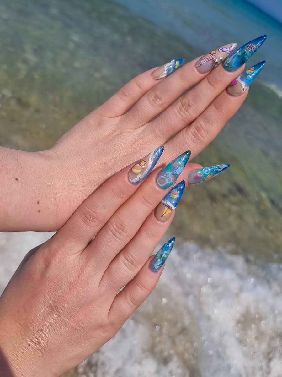 Beach theme nail art with hand-painted ocean waves and 3D starfish at Aesthete Beauty Dundee
