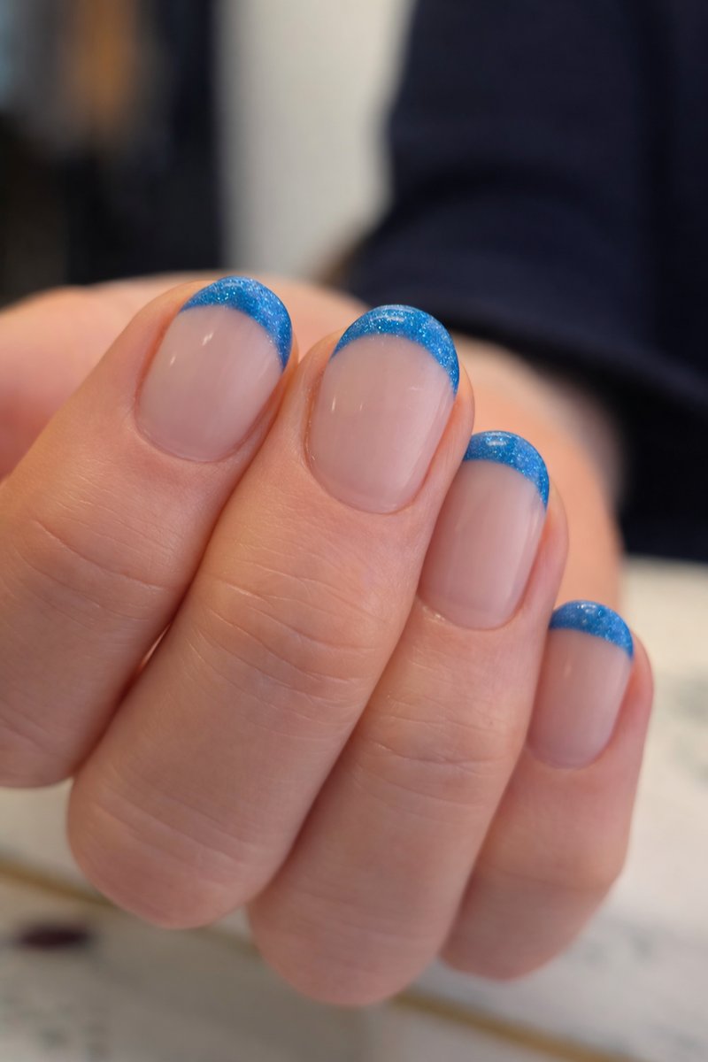 Blue glitter French manicure with BIAB strengthening in Dundee