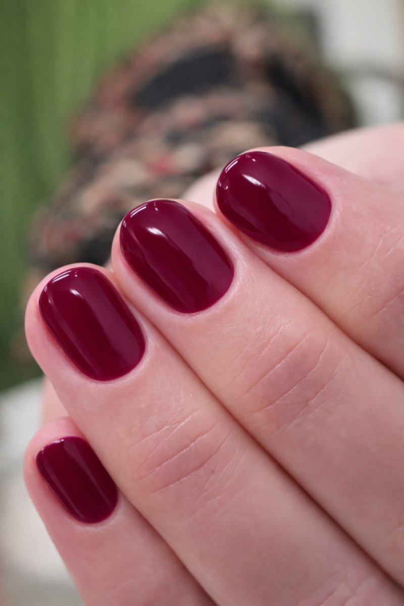 Gel polish with Russian manicure preparation in deep berry at Aesthete Beauty Dundee