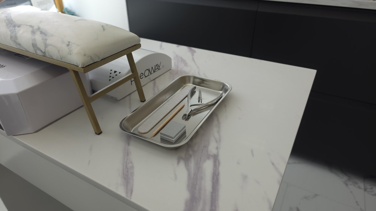 Clean salon station with individually prepared tool tray at Aesthete Beauty Dundee