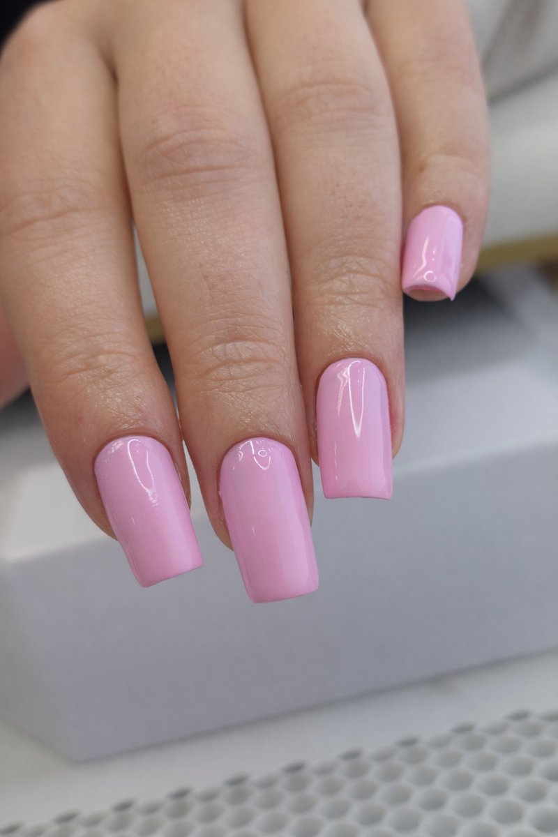 Candy pink gel polish on square nails at Aesthete Beauty Dundee