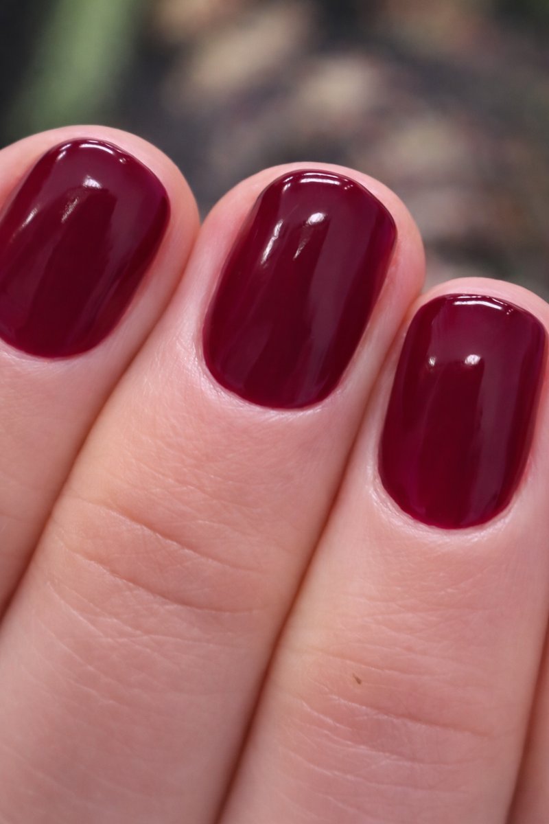 Deep wine burgundy HEMA-free gel on short round nails at Aesthete Beauty Dundee